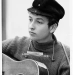 Bob Dylan jeune guitare harmonica portrait photo